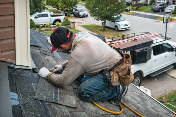 Professional Roofing technician working in Vestal, NY